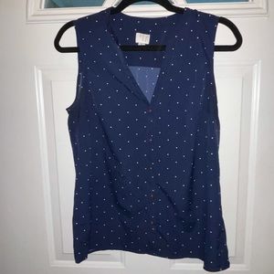 blue sleeveless blouse